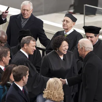 Chief Justice John G. Roberts Jr. shakes hands with Vice President Biden.