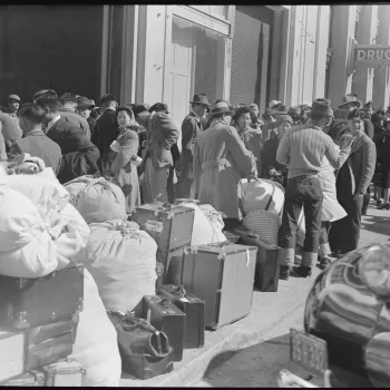 In San Francisco, Japanese Americans wait for train to internment camps. 