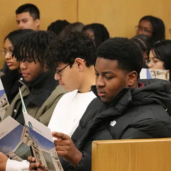 Students prepare for an interactive courtroom simulation exercise during a Bill of Rights Day civics education event at the federal courthouse in Washington, D.C.