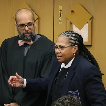 A court security officer speaks to students about her path to a career in the federal courts.