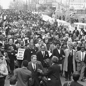 On April 8, grieving followers gather for the march Martin Luther King, Jr., had planned to lead. 