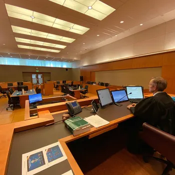 Chief Judge Philip A. Brimmer, of the District of Colorado, presiding in an empty courtroom.