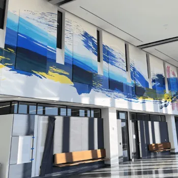 An abstract mural of the Susquehanna River stretches across the entryway walls of the new federal courthouse in Harrisburg, Pennsylvania.