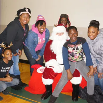 The district also hosts a yearly holiday party for children living in the projects of East St. Louis.