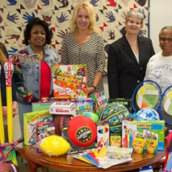 Over $500 worth of toys and school supplies were donated by the district to the East St. Louis Project Success program.