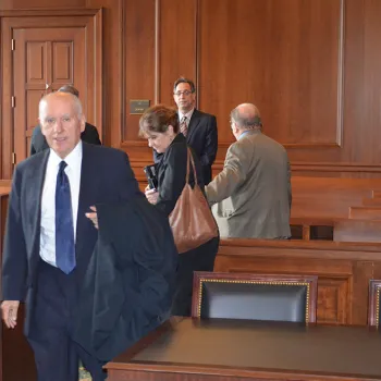 Due to the inoperable elevators, Judge Castel enters the courtroom through the main door instead of the Judges' separate entrance.