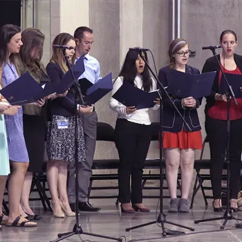 Saint Louis University law school choir sings.