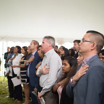 New citizens say the Pledge of Allegiance. 