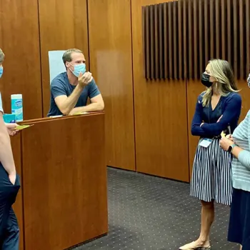 Teachers discuss the role of the federal Judiciary after observing a court proceeding at a teachers institute in Chicago.