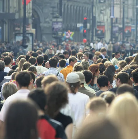 Image of a crowded city street 