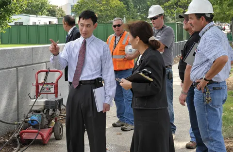 Man and woman meeting about the perimeter security installation