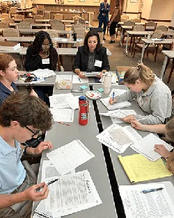 Students prepare for a proceeding during The Supreme Court and My Hometown program in St. Louis.