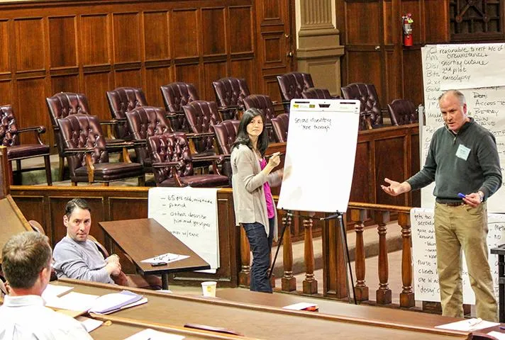 Workshop participants practice breaking down the facts of a case during a trial skills workshop held at the California Western School of Law in San Diego