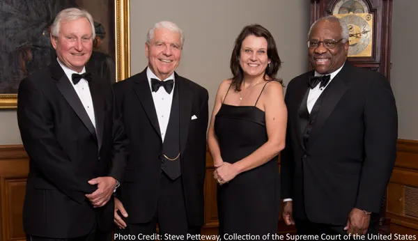 AO Director Thomas F. Hogan, second from left, is flanked by the committee that gave him the Devitt Award. From left, they are Joel F. Dubina, chief judge of the U.S. Court of Appeals for the Eleventh Circuit; Lisa Godbey Wood, chief judge of the U.S. Dis