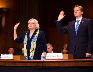 Judge Julia S. Gibbons and W. West Allen, of the Federal Bar Association, are sworn in before testifying.